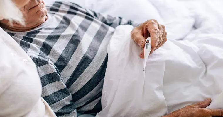 My 86-year-old mother has been experiencing extreme chills in the evenings. Does anyone know what might cause this? We can’t get her warm.